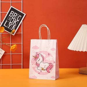 Pink kraft paper gift bag with cute cartoon unicorn illustration and sturdy white rope handles