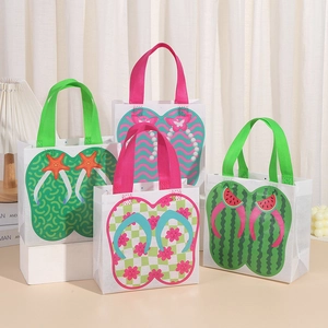 Set of four non-woven summer gift bags with colorful flip-flop patterns and vibrant handles