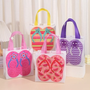 Set of four non-woven gift bags with vibrant summer flip-flop prints and colorful handles