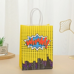 Yellow pop art candy gift bag with bold Wham print and white woven handles
