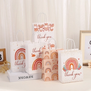 Boho rainbow paper gift bags with white handles and Thank You text for parties