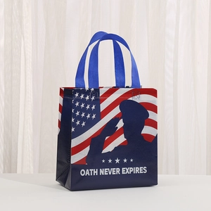 Patriotic non-woven tote bag with US flag design and Veterans Day soldier silhouette