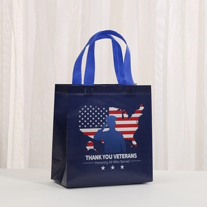 Close-up of patriotic non-woven tote bag with American flag map and veteran salute design