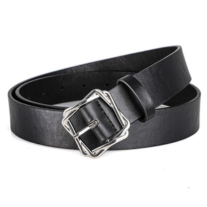 Detail of a minimalist black leather belt featuring a unique silver double square buckle