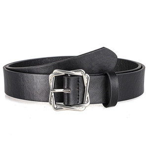 Detail of minimalist black leather belt featuring a modern silver double-wrap square buckle