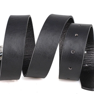Detail of premium black leather belt texture with precision edges and metal pin holes