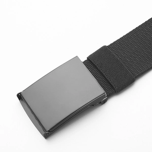 Detailed close-up of matte black metal buckle and woven nylon tactical belt texture