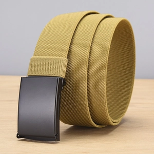 Close-up of khaki elastic braided nylon belt with black matte automatic buckle on wood surface