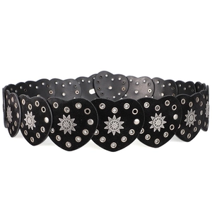 Bohemian black leather belt featuring stitched heart shapes and silver starburst studs