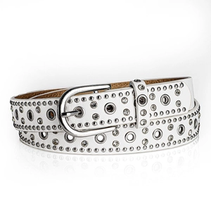Detail of white PU leather belt with silver metal grommets and sparkling rhinestones