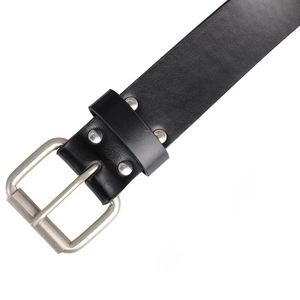 Close-up of black leather belt with silver metal buckle and reinforced rivet details