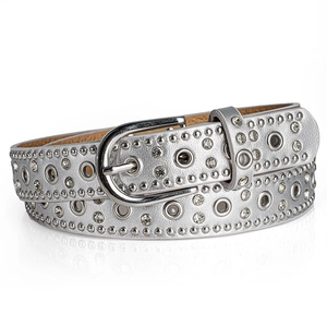 Detail view of silver punk belt with triple rows of rivets, eyelets and sparkling rhinestones
