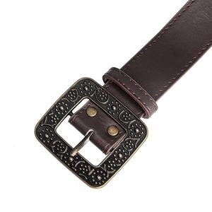 Detail of dark brown leather belt featuring an antique bronze floral engraved metal buckle