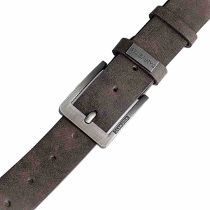Close-up of vintage brown leather belt with brushed metal buckle and engraved logo detail