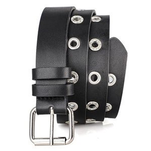 Punk style black leather belt with silver eyelets and rhinestone accents on white background
