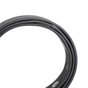 Detail of black leather belt with silver metal eyelets and premium grain texture