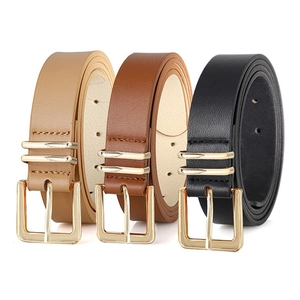 Drie minimalistische damesriemen in kaki bruin en zwart met gouden gespen en lederen lussen