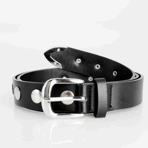 Detail of a black leather punk belt featuring shiny silver rivets and a classic pin buckle