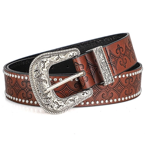 Detailed view of brown leather western belt with silver floral buckle and metal studs