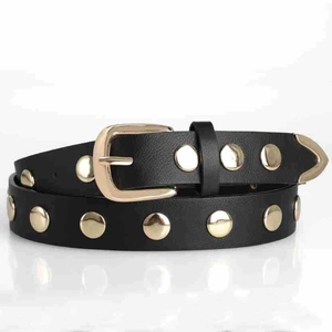 Close-up of black punk belt featuring dual rows of gold rivets and a polished metal buckle