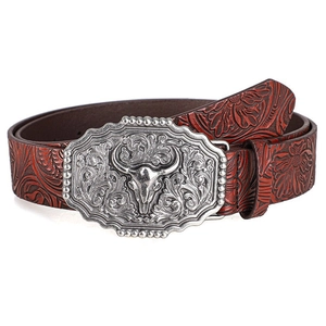 Vintage western leather belt featuring embossed floral patterns and bull head buckle
