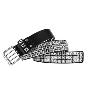 Detail of a black punk leather belt with triple-row silver square metal studs and buckle