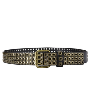 Close-up of vintage punk leather belt featuring three rows of square metal studs and eyelets