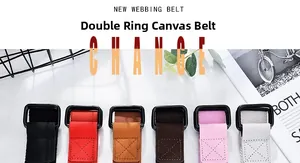 Detail showing various colors of double D-ring canvas belts with reinforced stitching