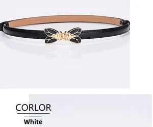 Detailed view of women's black leather belt with golden butterfly buckle and enamel inlay