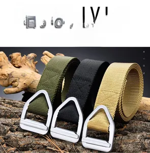 Tactical nylon outdoor belts in olive green, black and khaki on rustic wood base