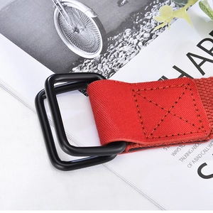 Red canvas belt with black matte double ring buckle and cross stitching details