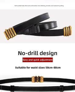 Detail of black genuine leather thin belt with gold buckle and precise stitching
