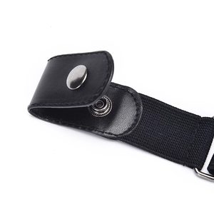 Detail of the black elastic belt showing leather end, silver metal snap, and stitching