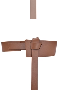 Detail of a brown lychee pattern leather wide corset belt with a unique knot closure
