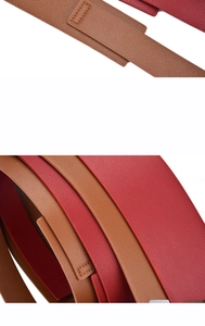 Detailed close-up of brown and red leather wide waist belts with lychee texture and stitching