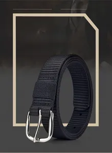 Close-up of black nylon woven belt with a polished silver metal pin buckle for casual wear
