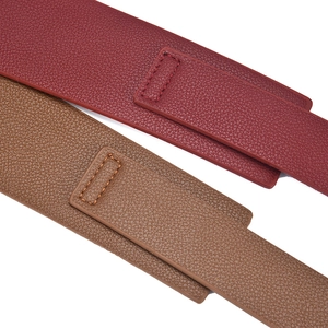 Litchi texture wide leather waist belt in burgundy and tan colors for dresses and coats