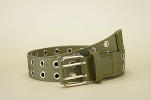 Detail of army green canvas belt featuring double-pin metal buckle and decorative eyelets