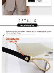 Detail of adjustable black slim waist belt with gold alloy buckle and 110cm length