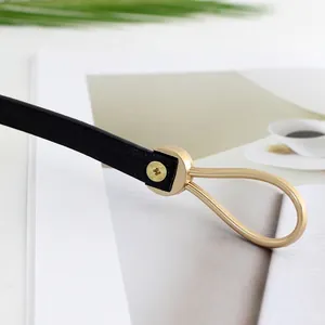 Slim black leather belt with golden U-buckle and adjustable screw length feature