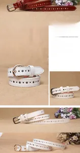 Close-up of women's hollowed sun flower belt with metallic buckle and retro texture