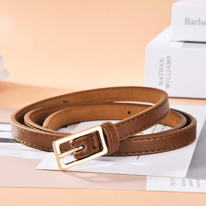 Brown slim leather belt with polished gold buckle for dresses and jeans, elegant style