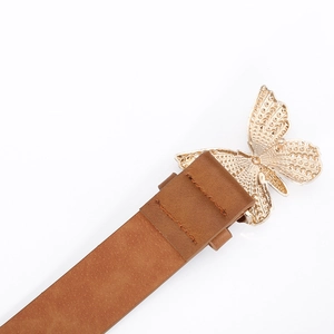 Detail of a brown leather belt featuring a golden butterfly buckle with embossed textures