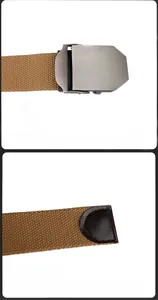 Detailed view of the dark brown canvas belt featuring a matte alloy buckle and leather tip