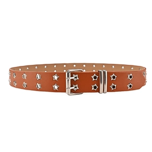 Close-up of brown leather punk belt with double-row star eyelets and silver buckle