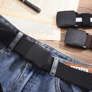Men's nylon woven canvas belt with plastic buckle shown on denim jeans in casual style