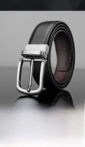 Detailed macro shot of the premium silver zinc alloy pin buckle on a black leather belt