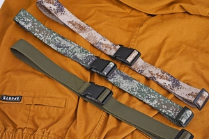 Three tactical nylon belts with camouflage and solid green colors featuring plastic buckles
