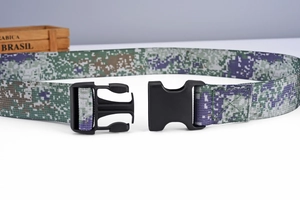Close-up of digital camouflage nylon belt with quick-release black plastic buckle