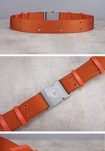 Detail showing bright orange nylon tactical belt with dual rows of reinforced metal eyelets